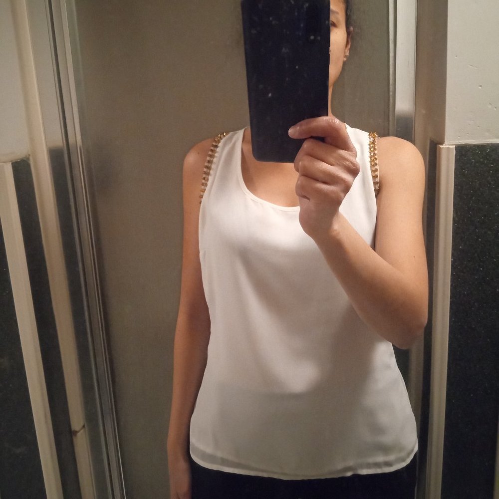 Women's sleeveless off-white blouse Size M